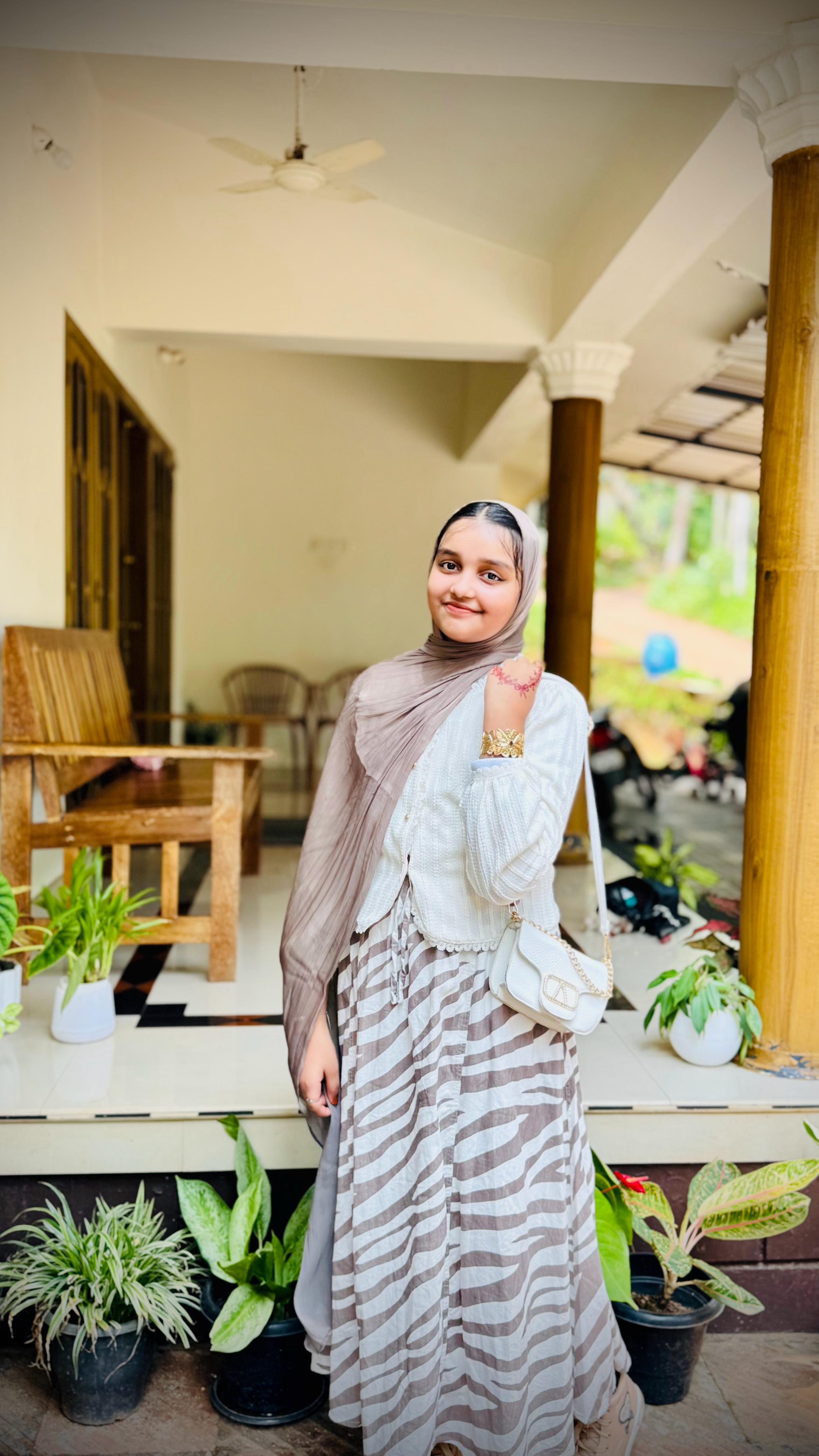 Ninus smiling in the sunlight